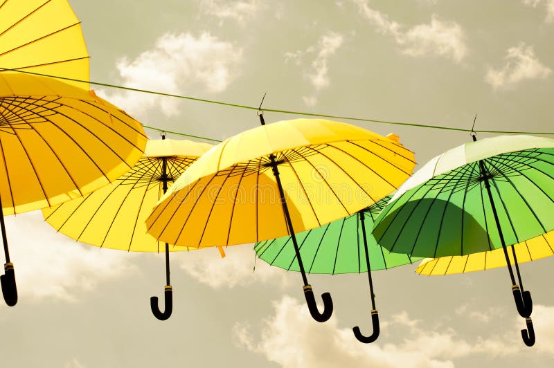 Yellow and Green Umbrellas. Stock Image Image of line, blue 55099335