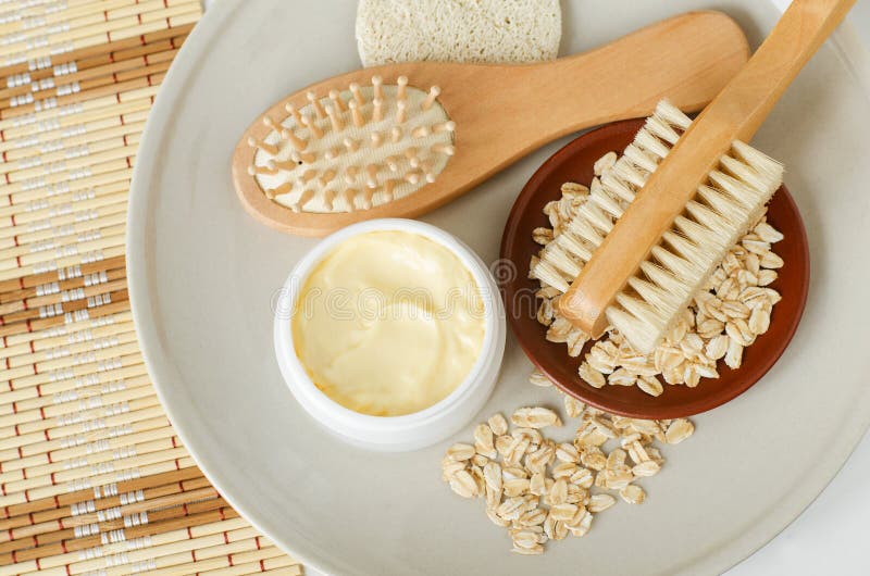 Yellow hair mask banana face cream, shea butter facial mask, body butter in the small white jar, oatmeal, massage body brush