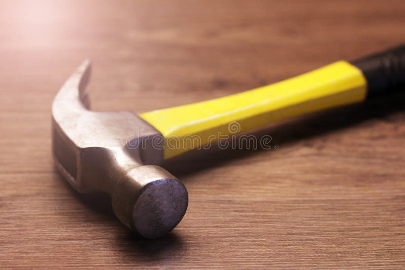 The Yellow Hammer and Nails, Tools for Construction and Repair Stock
