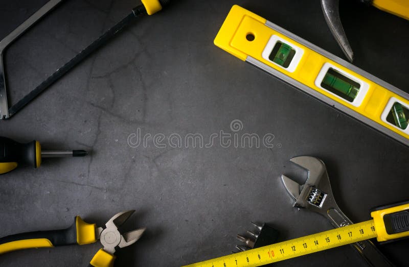 Yellow Hardware Tools on Black Concrete Background with Some Space for Text Stock Photo - Image of handyman, pliers: 161587198 Yellow Hardware Tools on Black Concrete Background with Some Space for Text Stock Photo - Image of handyman, pliers: 161587198
