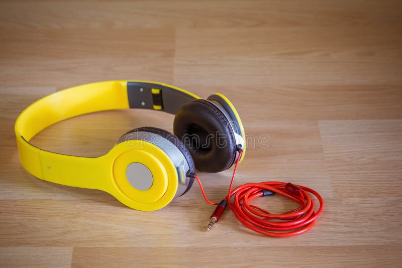 Yellow Headphone with 3.5 Mm. Stereo Jack on Wood Background Stock Image Image of audio