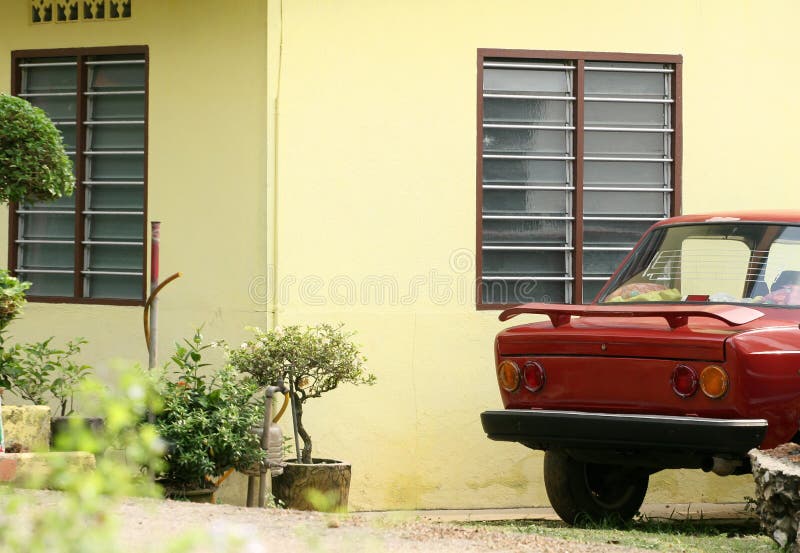 Yellow House and Outdoor Garage