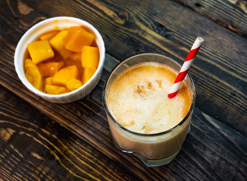 Yellow Indian Mango Yoghurt Drink Mango Lassi or Smoothie with Turmeric ...