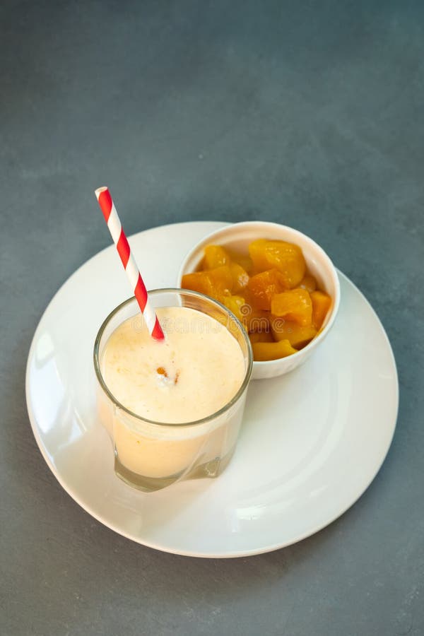 Yellow Indian Mango Yoghurt Drink Mango Lassi or Smoothie with Turmeric ...