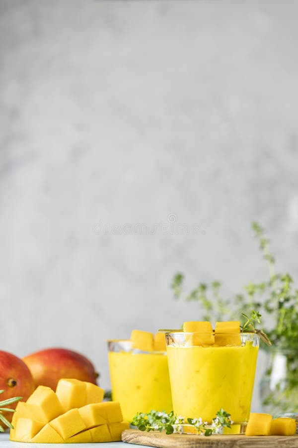 Yellow Indian Mango Yogurt Drink Mango Lassi or Smoothie with Turmeric ...
