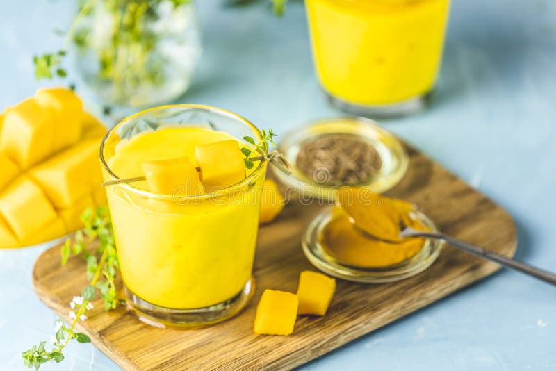 Yellow Indian Mango Yogurt Drink Mango Lassi or Smoothie with Turmeric ...