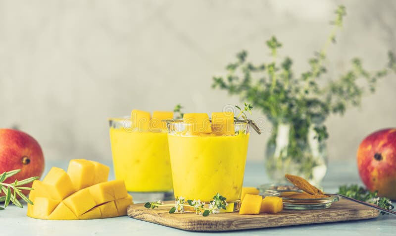 Yellow Indian Mango Yogurt Drink Mango Lassi or Smoothie with Turmeric ...