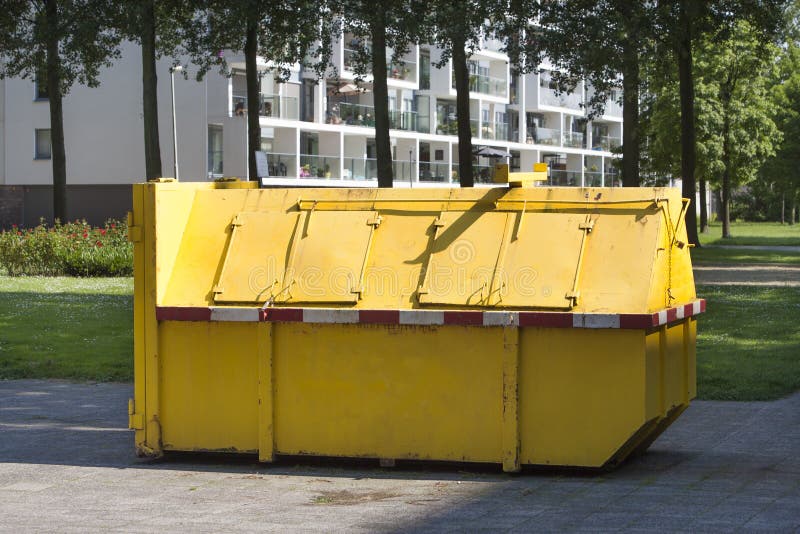 Yellow industrial garbage skip royalty free stock image