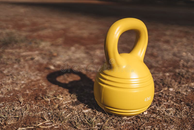 Yellow Kettlebell stock image. Image of heavy, healthy 11629427