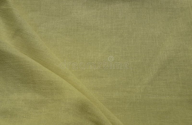 Yellow linen fabric. stock photo. Image of clothing 206581396