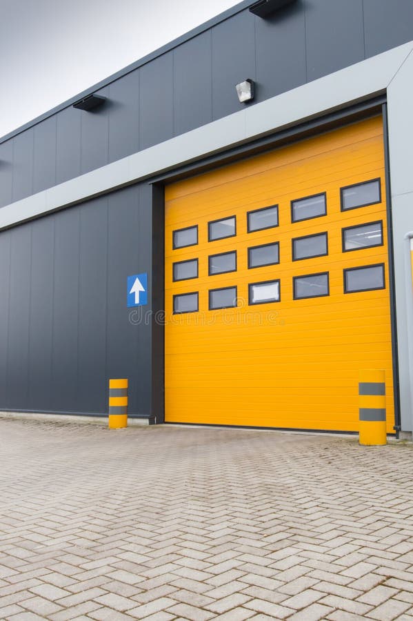 Yellow loading door in industrial warehouse