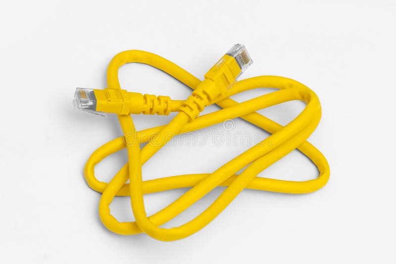 yellow network cable, isolated on white background. Closeup LAN cables with connector. Lan cable for internet network connection. Ethernet network cable roll.