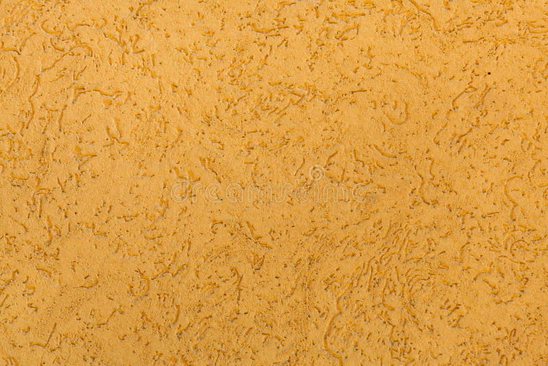 Yellow Ochre Painted Stucco Wall. Background Texture Stock Image