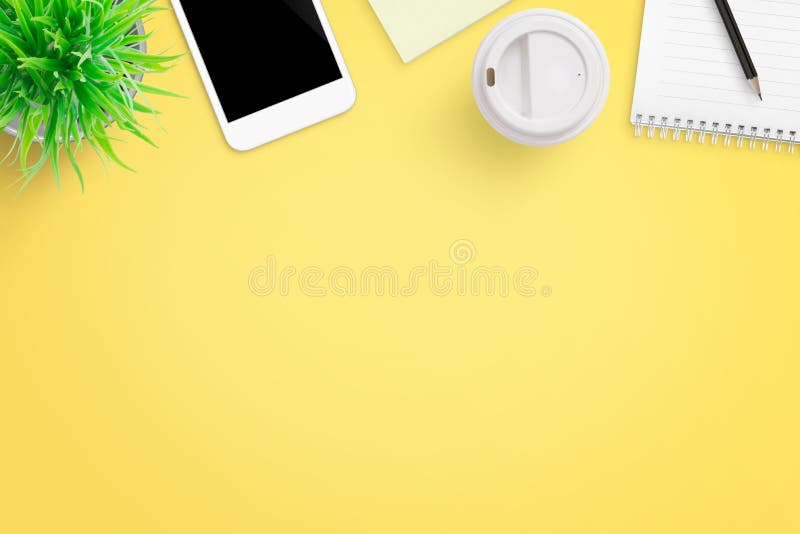 Premium Photo  Blank paper notebook and damaged sheets on yellow  background office desk table concept
