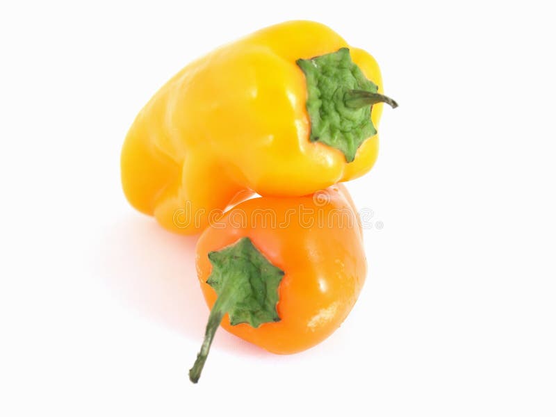 Yellow and Orange Bell Pepper isolated on a white background. Yellow and Orange Bell Pepper isolated on a white background.