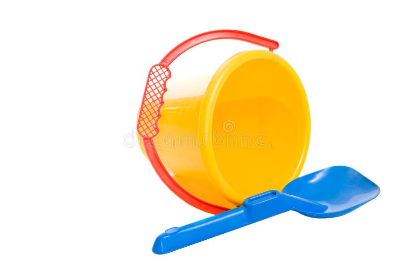 A Yellow Pail and Blue Shovel on the Beach with a Starfish Stock Image