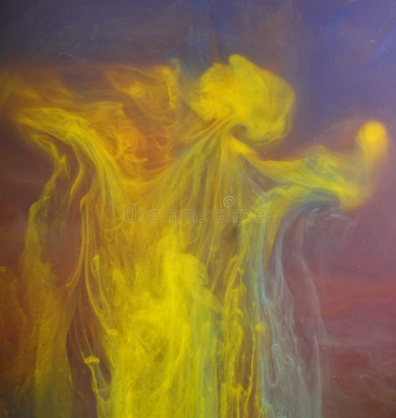 Yellow paint in water royalty free stock photo