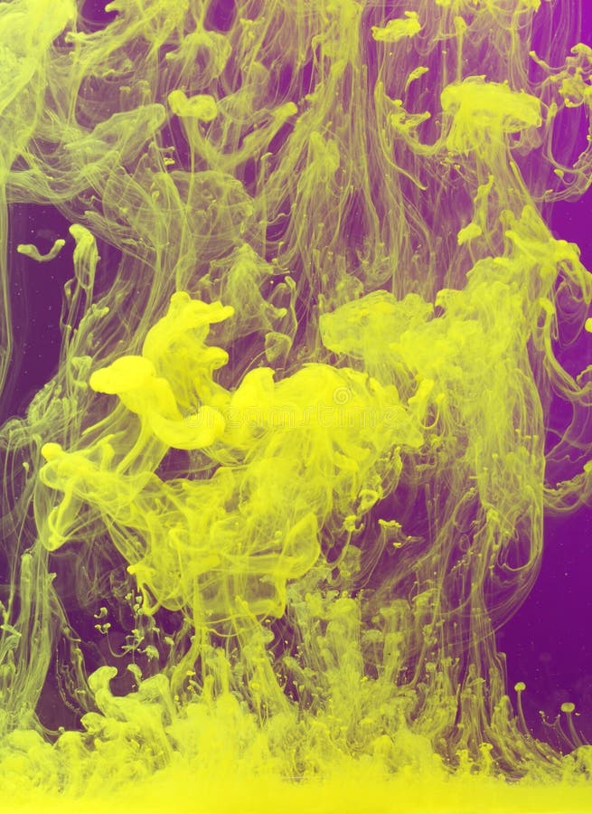 Yellow paint in water royalty free stock images
