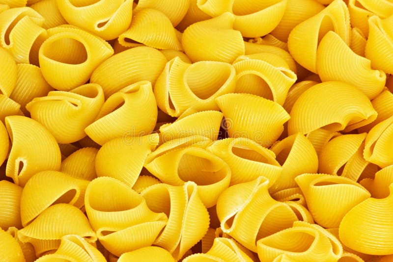 Yellow pasta closeup stock image. Image of delicious 25323989