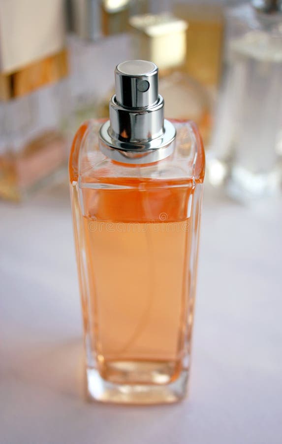 Yellow perfume bottle stock image. Image of scent, perfume 32494039