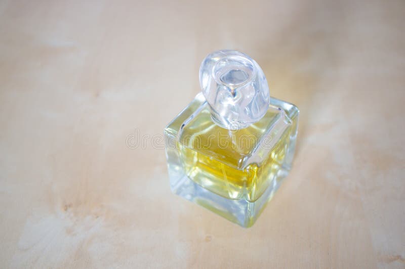 Yellow perfume bottle stock photo. Image of expensive 44741498