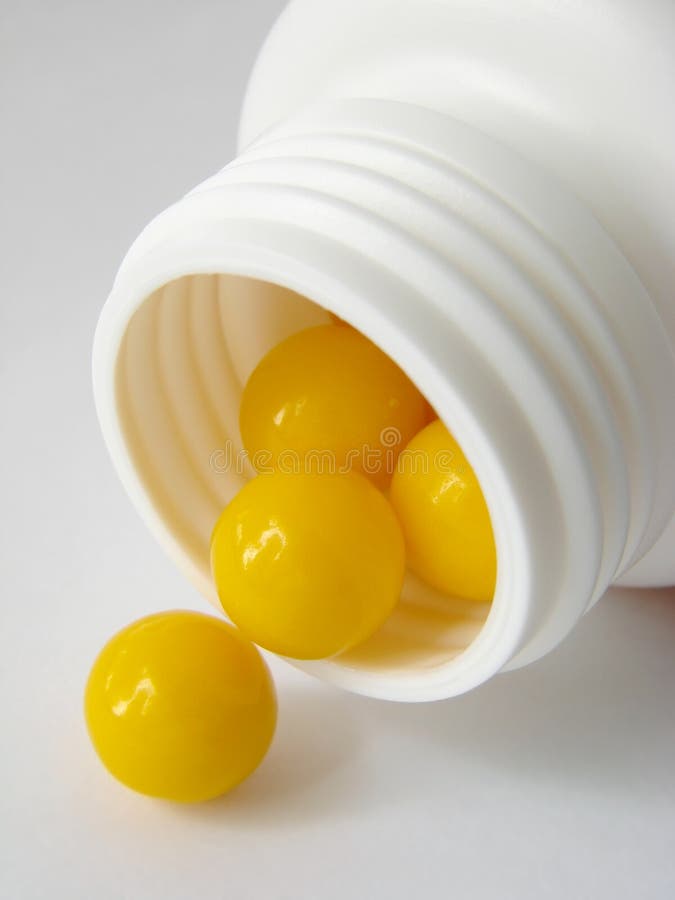 Yellow pills stock photo. Image of pharmacy, healthcare 28652664