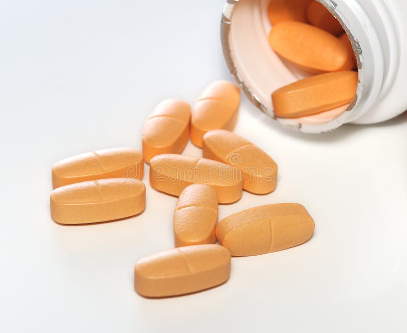 Yellow pills stock image. Image of medicinal, vitamins 7669895