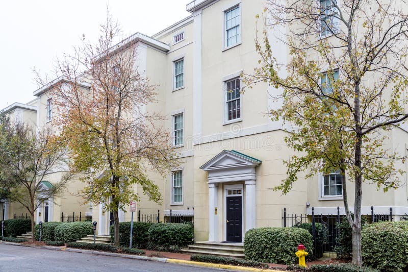 Yellow Plaster Apartments stock photo. Image of building 65285996