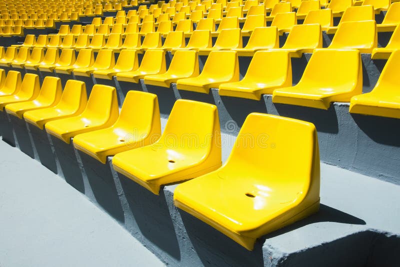 Yellow Plastic Chairs in a Row Stock Image Image of group, soccer