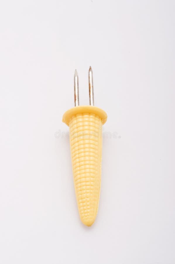 Yellow Plastic Corn Cob Holder Stock Photo Image of color, dinner