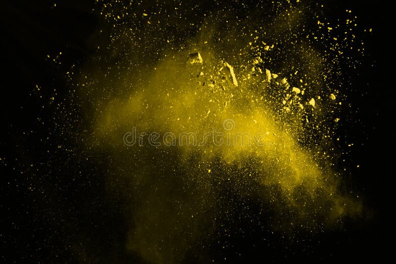Yellow Powder Explosion on Black Background. Stock Photo Image of