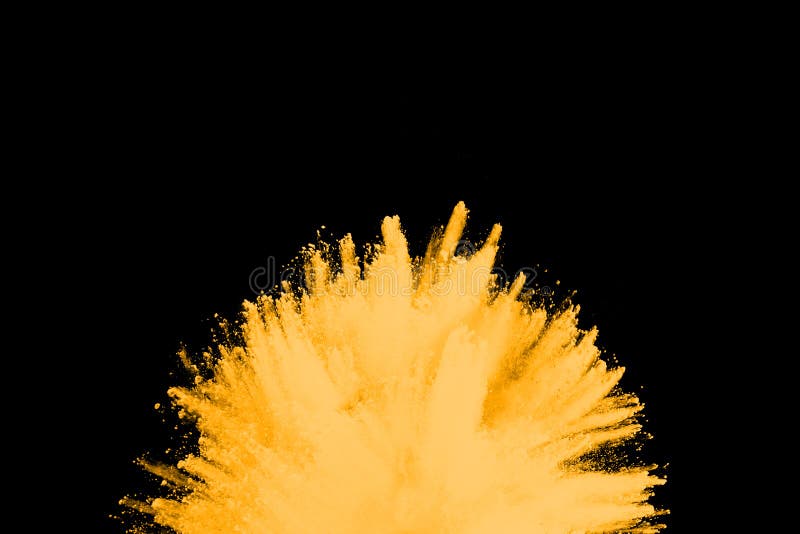 Yellow Powder Explosion on Black Background. Stock Photo Image of