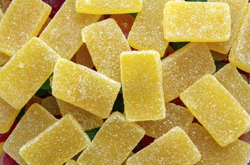 Yellow Rectangular Jelly Candies Pattern Background. Yellow Rectangular