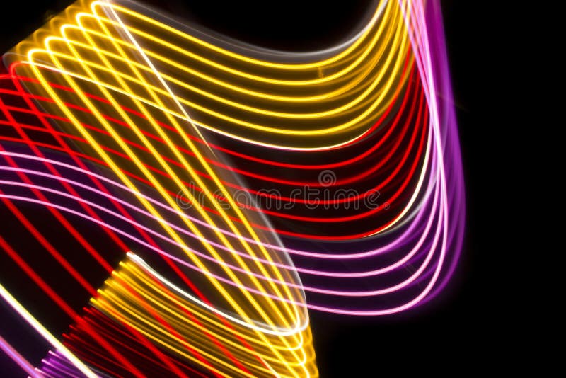 Yellow, red and pink light curve lines on a black background. Yellow, red and pink light curve lines on a black background