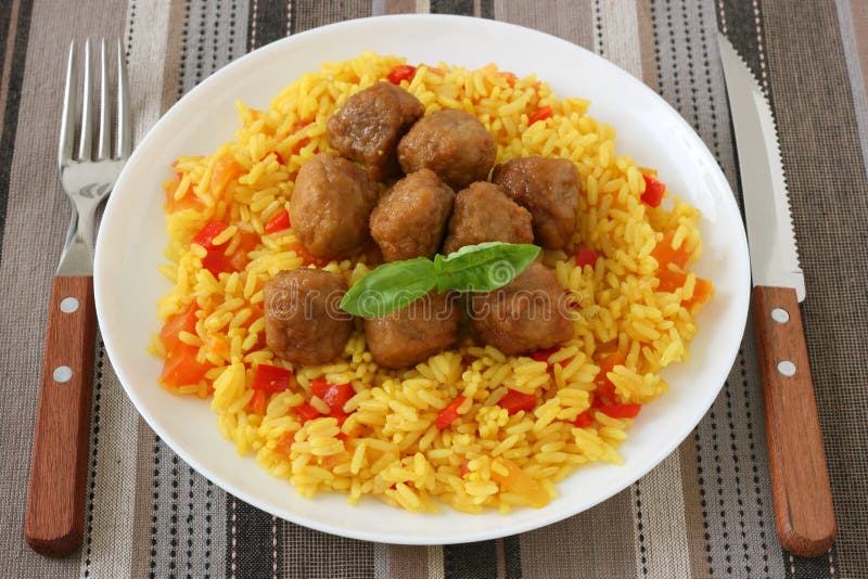 Yellow rice with meatballs