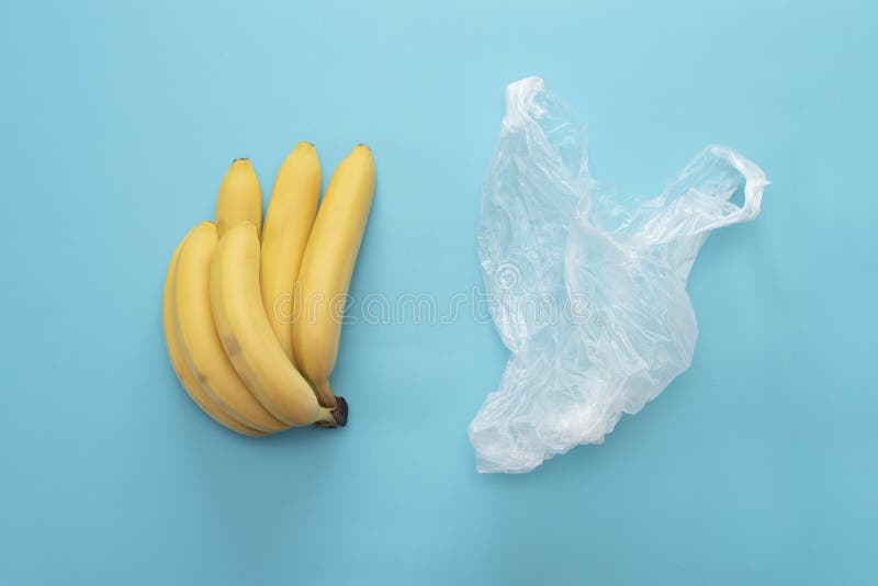 Yellow Ripe Fresh Bananas and Transparent Plastic Bag Stock Photo