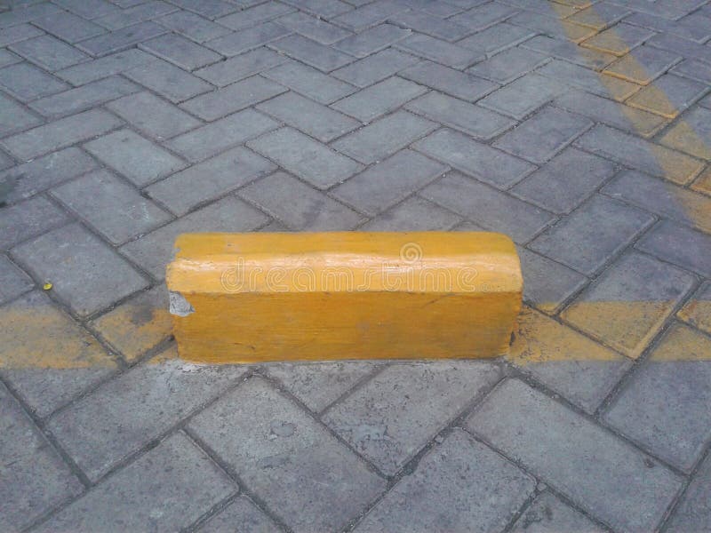 Yellow Road Divider in Motorcycle Parking Stock Image Image of lane