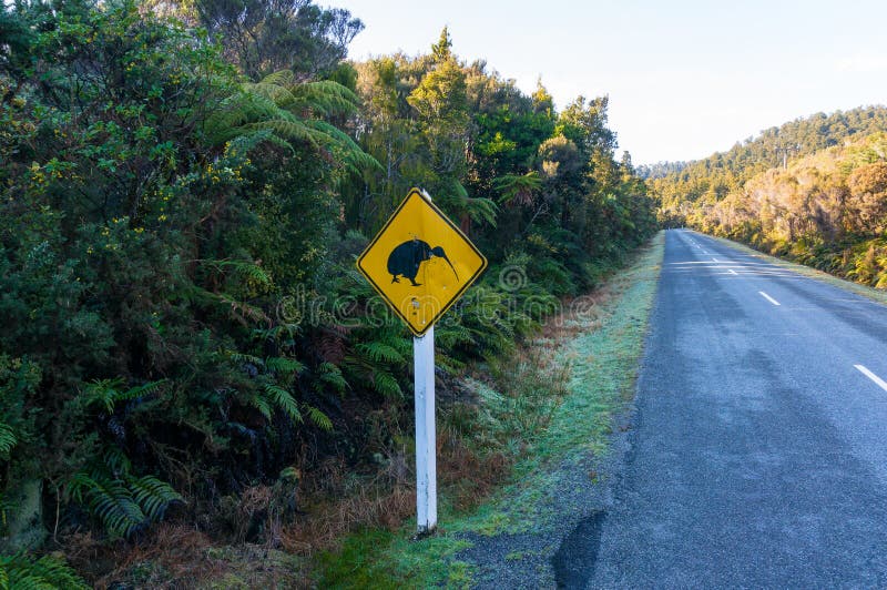 Yellow road sign with silhouette of kiwi bird royalty free stock photo Yellow road sign with silhouette of kiwi bird royalty free stock photo