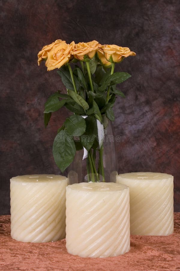 Yellow roses and candles stock photo. Image of bunch 11005792
