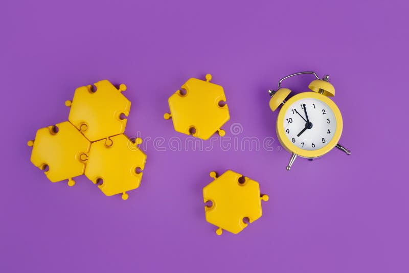 Yellow Round Alarm Clock And Puzzles On The Purple Background Time Concept Stock Image Image Of Awake Number 192691917