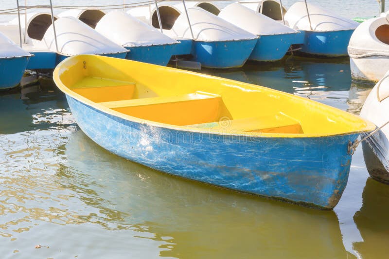 Yellow rowboat stock image. Image of antique, rustic 50663077