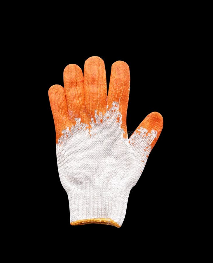 Yellow rubber protective gloves on a black background royalty free stock photography