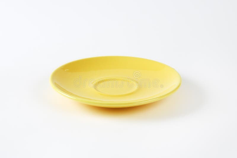 Yellow saucer stock image. Image of kitchenware, pottery 49504699