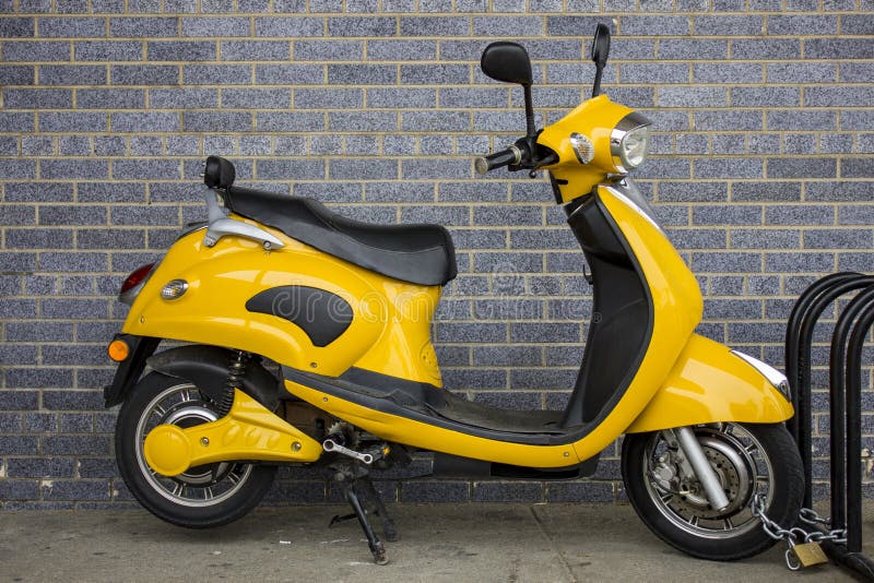 Yellow Scooter editorial stock image. Image of wall, traffic 72328099