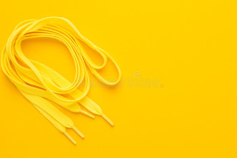 Yellow shoe laces stock photo. Image of closeup, training 94555412