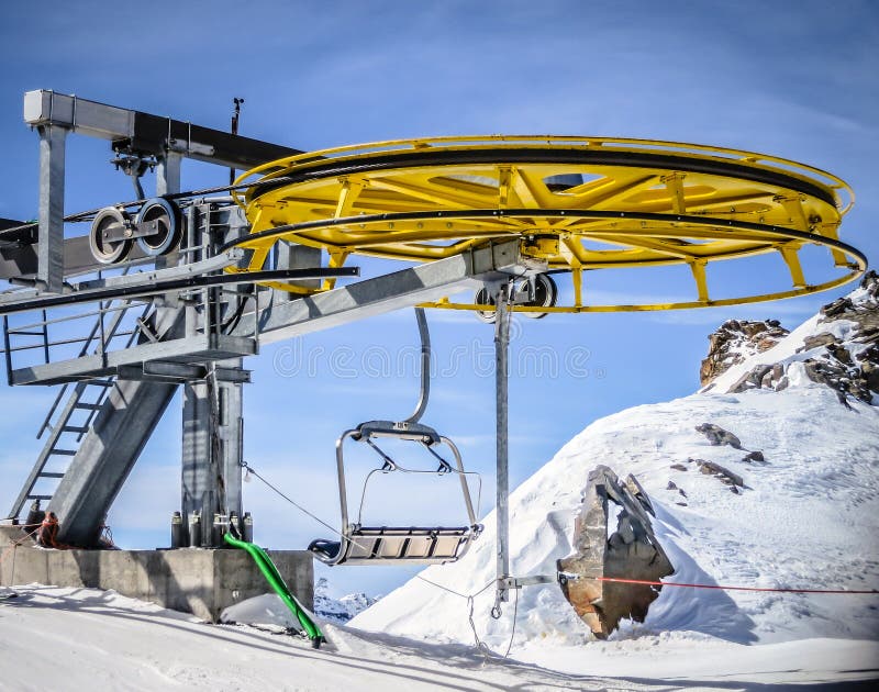 Top Ski Lift Wheel Covered with Huge Icing. Mountain Winter Snapshot