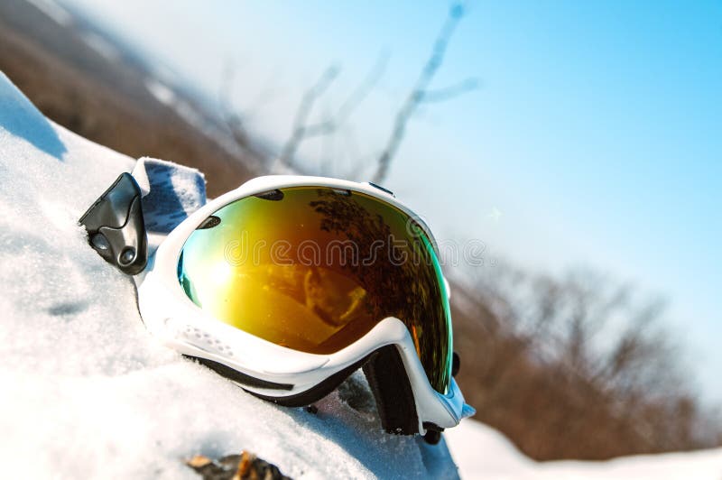 Yellow ski mask on snow stock photo. Image of reflect 109792392