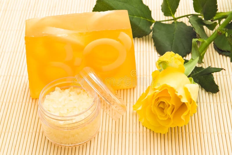 Yellow soap and rose royalty free stock photos