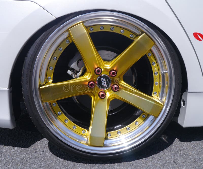 Yellow 5 Spoke Car Wheel Picture. Image 82948456