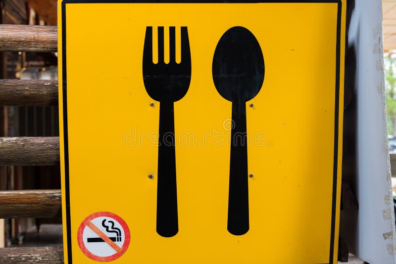 Yellow Spoon and Fork Sign. Stock Photo Image of spoon, food 96725012